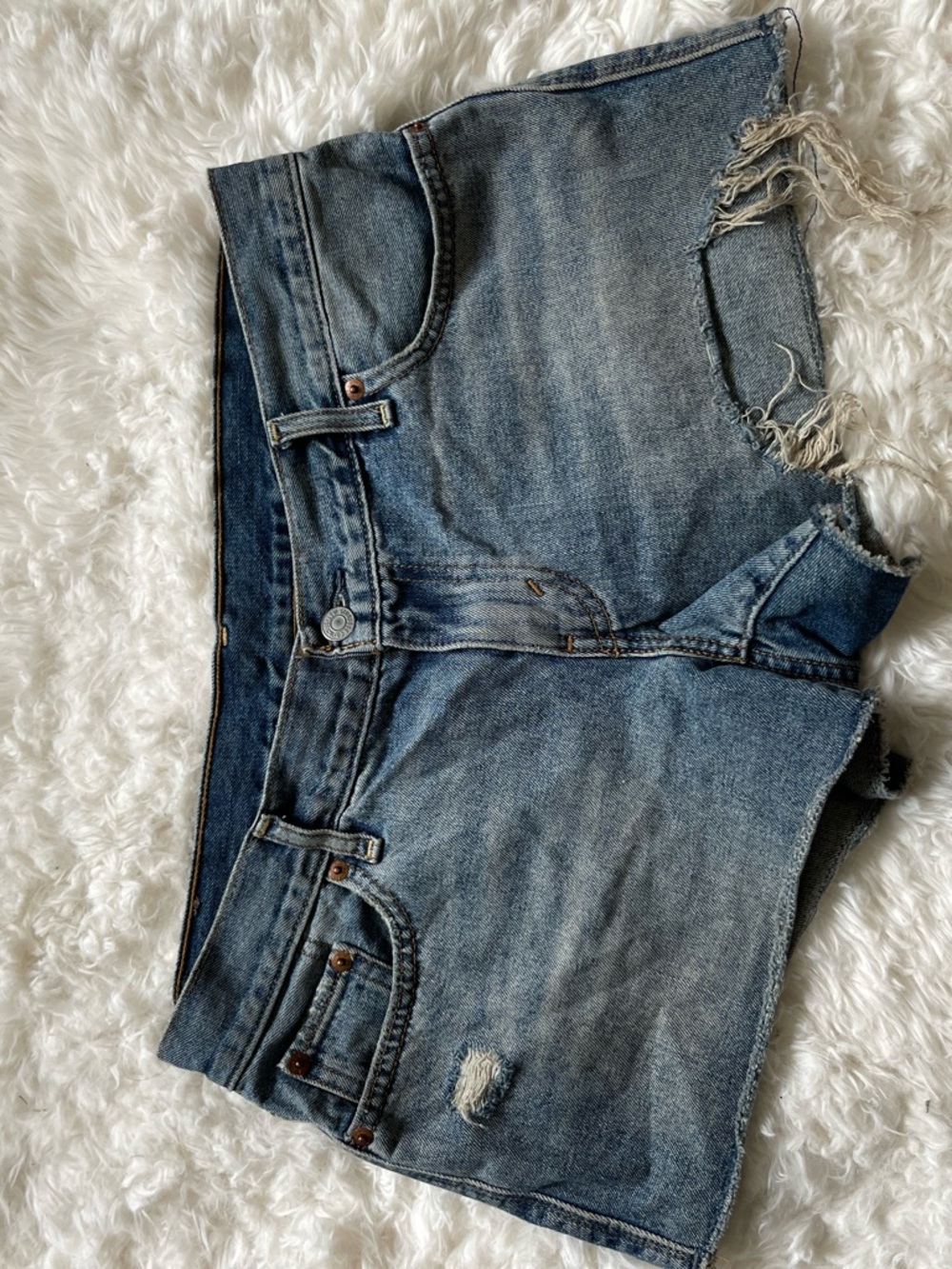 Levi's Distressed Light Blue Denim Cutoff Shorts